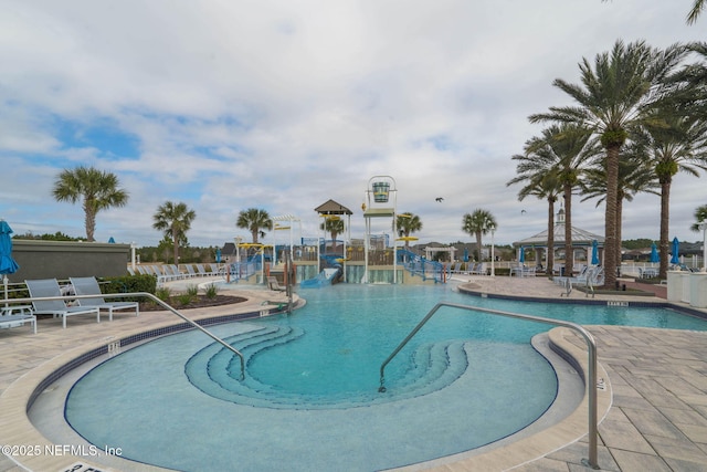 73 Ripple Rd, Saint Johns, FL 32095 - community pool featuring a water slide, a gazebo, and a patio