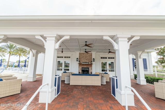 73 Ripple Rd, Saint Johns, FL 32095 - view of patio featuring french doors, an outdoor living space with a fireplace, and ceiling fan