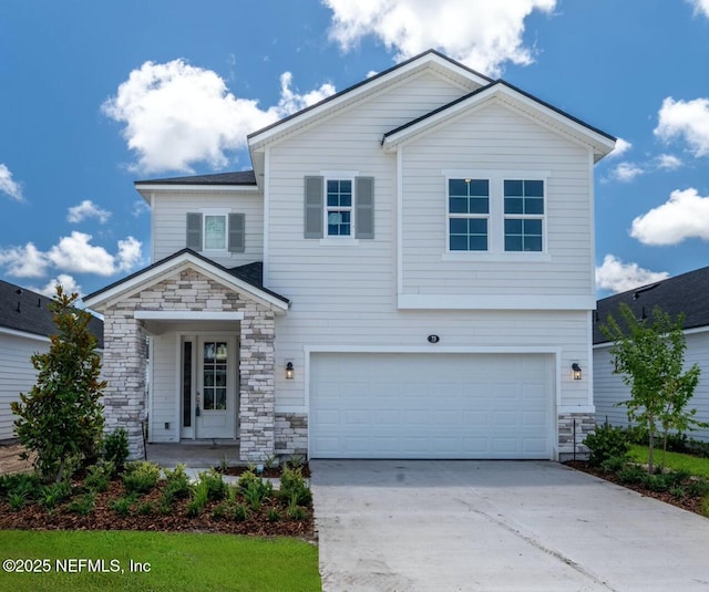 73 Ripple Rd, Saint Johns, FL 32095 - view of front of property featuring stone siding, an attached garage, and concrete driveway