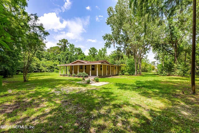 226 Six Pond Trl, Green Cove Springs, FL 32043 - view of grassy yard with covered porch