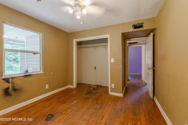 226 Six Pond Trl, Green Cove Springs, FL 32043 - unfurnished bedroom with wood finished floors, a closet, and ceiling fan