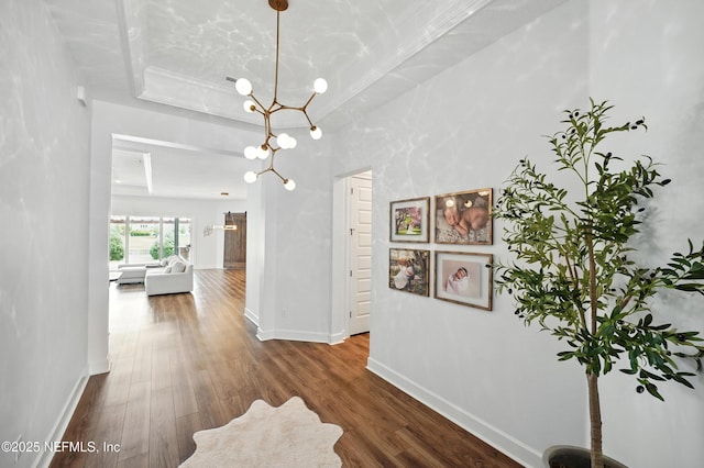 959 Crosswater Lake Dr, Ponte Vedra, FL 32081 - hallway with a chandelier and dark wood finished floors