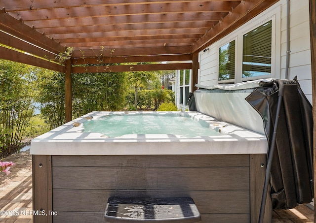 959 Crosswater Lake Dr, Ponte Vedra, FL 32081 - view of patio featuring a hot tub and a pergola