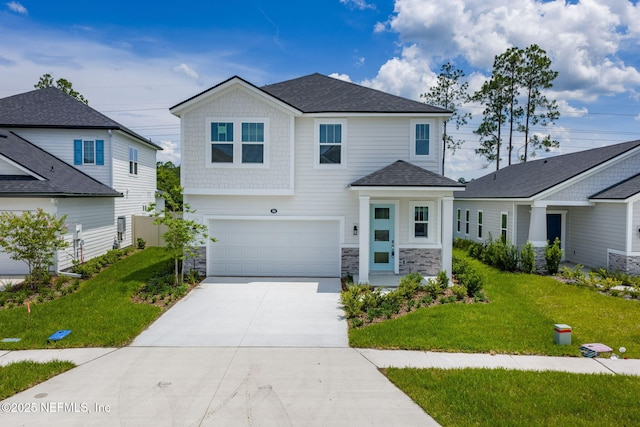 386 Whirlwind Pl, Saint Johns, FL 32095 - view of front of property with a garage, concrete driveway, a front yard, and stone siding