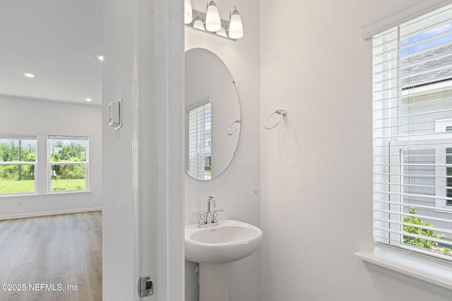 386 Whirlwind Pl, Saint Johns, FL 32095 - bathroom featuring healthy amount of natural light and wood finished floors