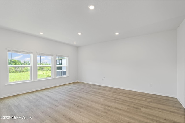 386 Whirlwind Pl, Saint Johns, FL 32095 - unfurnished room with light wood finished floors and recessed lighting