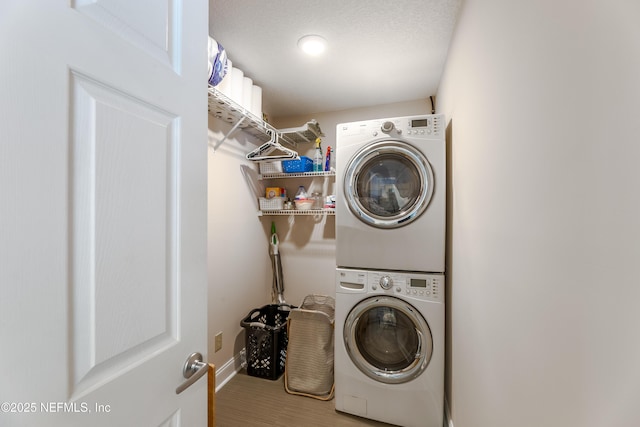 4521 Deep River Way E, Jacksonville, FL 32224 - laundry room with estacked washer and dryer and wood finished floors
