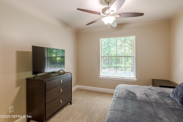 4521 Deep River Way E, Jacksonville, FL 32224 - bedroom featuring light colored carpet, a textured ceiling, and ceiling fan