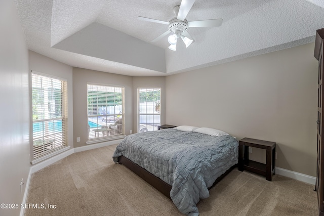 4521 Deep River Way E, Jacksonville, FL 32224 - carpeted bedroom with a textured ceiling, ceiling fan, and vaulted ceiling