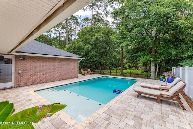 4521 Deep River Way E, Jacksonville, FL 32224 - view of swimming pool with a patio area and view of scattered trees