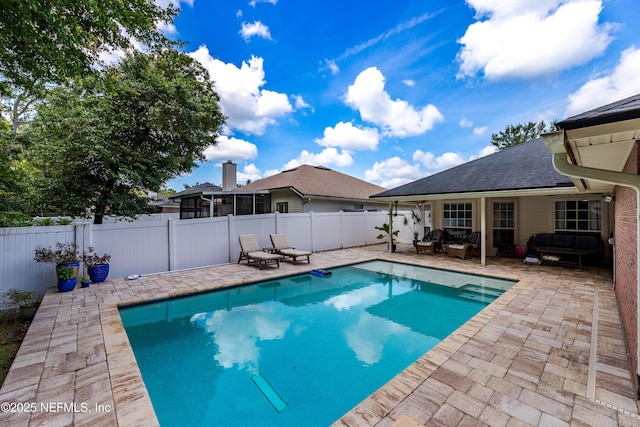 4521 Deep River Way E, Jacksonville, FL 32224 - view of swimming pool featuring a patio area, a fenced backyard, and an outdoor hangout area