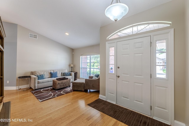 4521 Deep River Way E, Jacksonville, FL 32224 - foyer with vaulted ceiling and wood finished floors