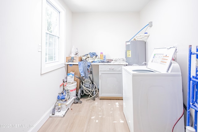 1841 W 11th St, Jacksonville, FL 32209 - laundry area featuring water heater, light wood-type flooring, and washer and dryer