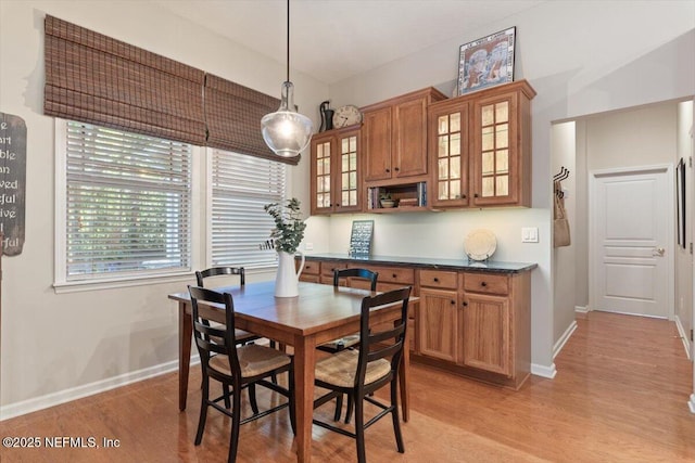 1060 Meadow View Ln, Saint Augustine, FL 32092 - dining space featuring baseboards and light wood-style flooring