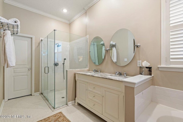 1060 Meadow View Ln, Saint Augustine, FL 32092 - full bathroom with crown molding, double vanity, a stall shower, tile patterned floors, and recessed lighting
