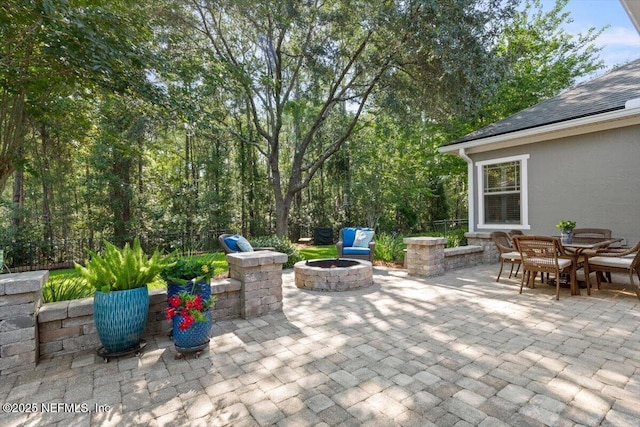 1060 Meadow View Ln, Saint Augustine, FL 32092 - view of patio featuring an outdoor fire pit and outdoor dining area