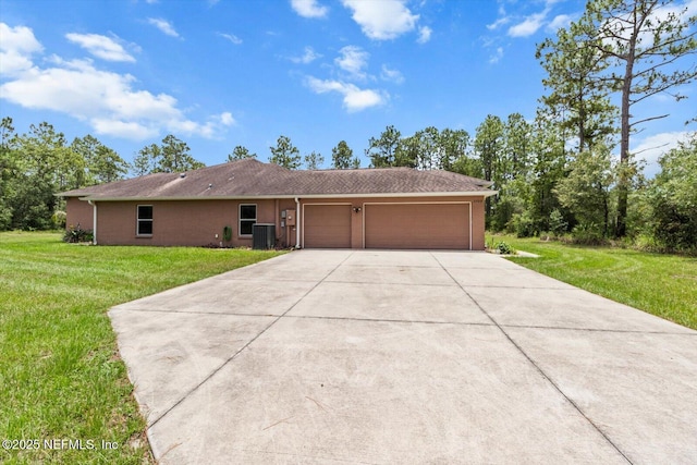 3728 W Florentine Dr, Citrus Springs, FL 34433 - single story home featuring a garage, concrete driveway, and a front lawn