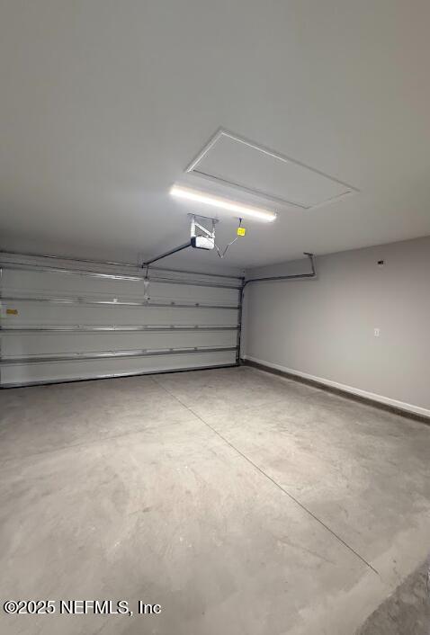 8045 Driggers St, Jacksonville, FL 32220 - garage with a garage door opener