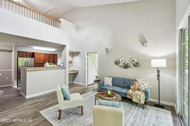 8550 Touchton Rd Unit 932, Jacksonville, FL 32216 - living area with wood finished floors and vaulted ceiling