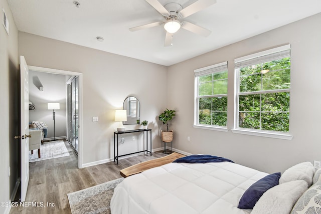 8550 Touchton Rd Unit 932, Jacksonville, FL 32216 - bedroom featuring wood finished floors and ceiling fan