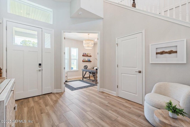 351 Palm Crst Dr, Ponte Vedra, FL 32081 - foyer with light wood-type flooring and a towering ceiling