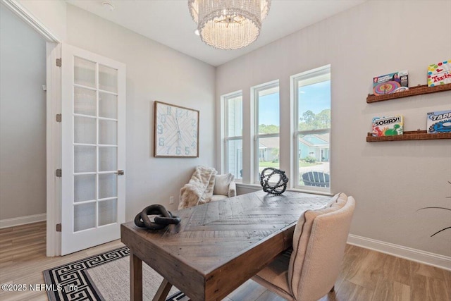 351 Palm Crst Dr, Ponte Vedra, FL 32081 - office area featuring a chandelier and wood finished floors