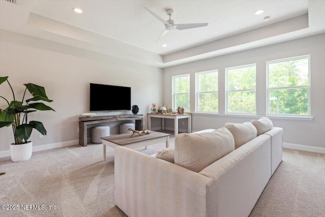 351 Palm Crst Dr, Ponte Vedra, FL 32081 - living area with light carpet, a ceiling fan, a raised ceiling, and recessed lighting