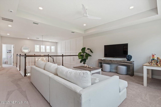 351 Palm Crst Dr, Ponte Vedra, FL 32081 - living room featuring light carpet, recessed lighting, ceiling fan, and a tray ceiling