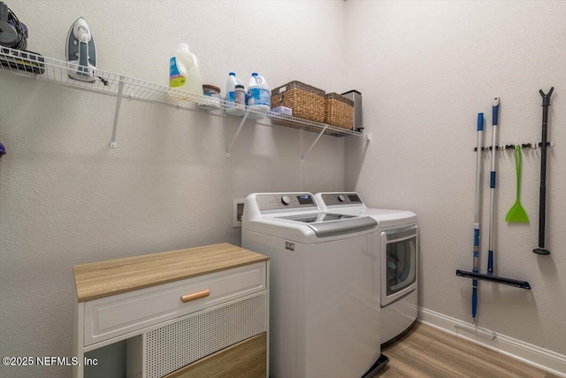 351 Palm Crst Dr, Ponte Vedra, FL 32081 - laundry area with washer and dryer and wood finished floors