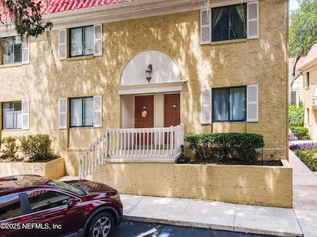 5811 Atlantic Blvd Unit 115, Jacksonville, FL 32207 - view of property with stucco siding