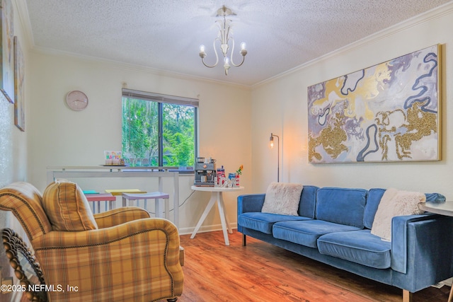 5811 Atlantic Blvd Unit 115, Jacksonville, FL 32207 - living area featuring a chandelier, wood finished floors, a textured ceiling, and crown molding