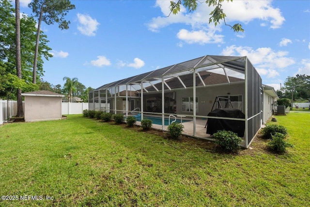 45 E Diamond Dr, Palm Coast, FL 32164 - rear view of house with a fenced backyard, a patio, and a lanai