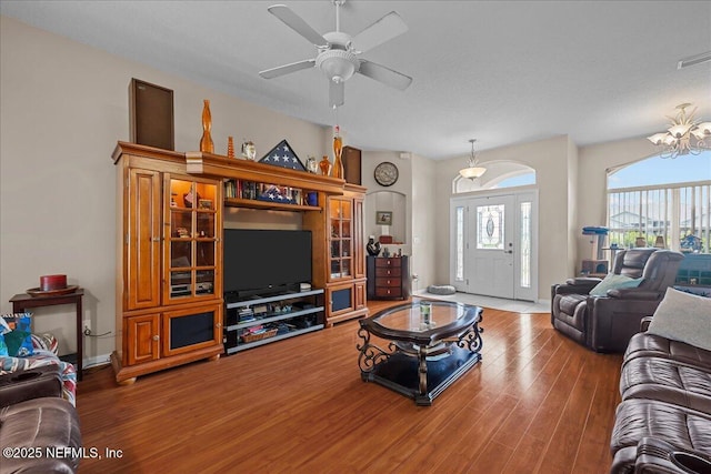 45 E Diamond Dr, Palm Coast, FL 32164 - living area with wood finished floors, a chandelier, and ceiling fan
