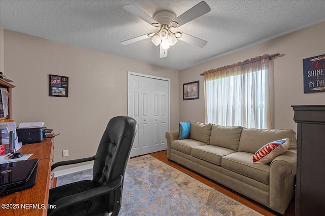 45 E Diamond Dr, Palm Coast, FL 32164 - office space with a ceiling fan, wood finished floors, and a textured ceiling
