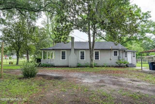 85215 Airplane Ln, Yulee, FL 32097 - back of property featuring roof with shingles