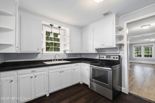 85215 Airplane Ln, Yulee, FL 32097 - kitchen with open shelves, stainless steel range with electric stovetop, dark countertops, white cabinets, and dark wood-type flooring
