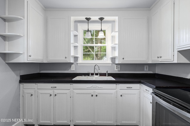 85215 Airplane Ln, Yulee, FL 32097 - kitchen featuring open shelves, white cabinetry, and dark countertops