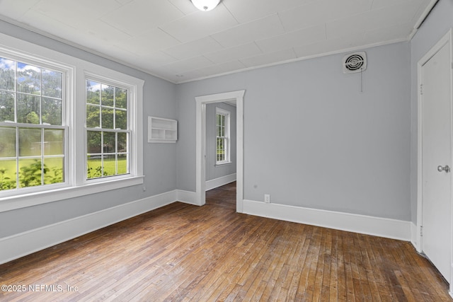 85215 Airplane Ln, Yulee, FL 32097 - unfurnished room with hardwood / wood-style floors and baseboards