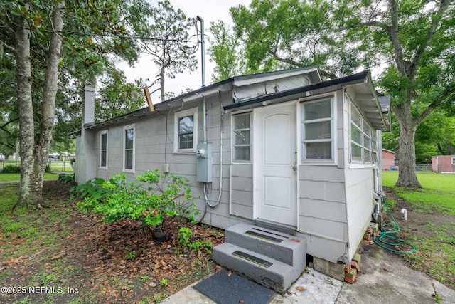 85215 Airplane Ln, Yulee, FL 32097 - view of front of property featuring entry steps and a chimney