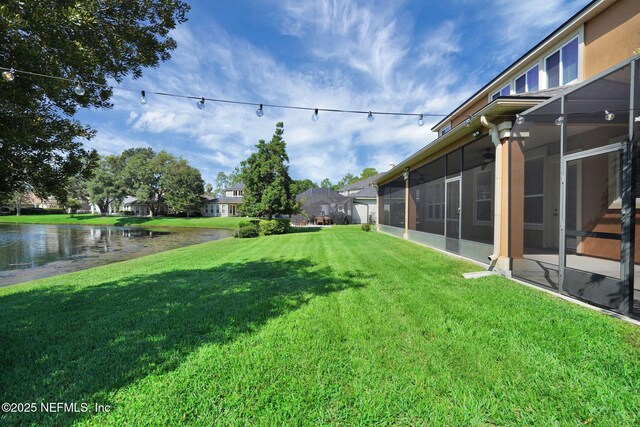 4431 Vista Point Ln, Orange Park, FL 32065 - view of green lawn featuring a water view and a sunroom