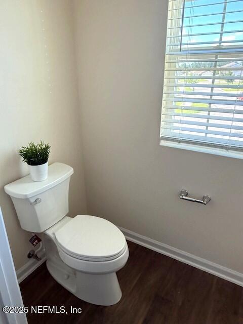 3432 Concord Ct, Green Cove Springs, FL 32043 - bathroom with toilet and wood finished floors