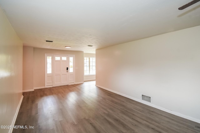 2415 Mill Creek Rd, Jacksonville, FL 32211 - entryway with dark wood-style flooring and ceiling fan