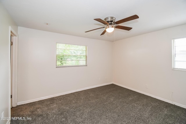 2415 Mill Creek Rd, Jacksonville, FL 32211 - unfurnished room with ceiling fan and dark carpet
