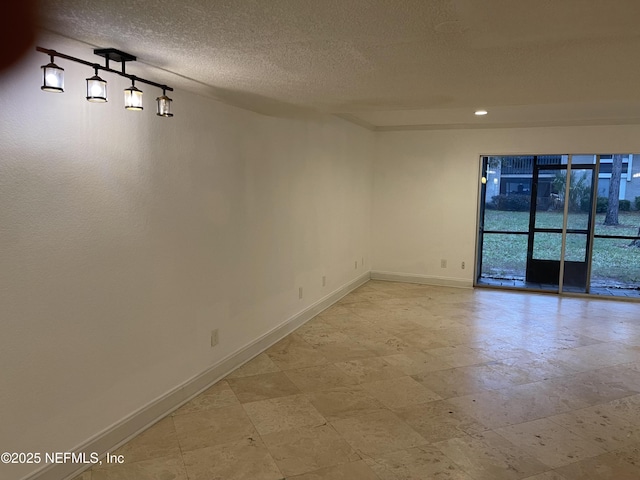 8880 Old Kings Rd S Unit 53, Jacksonville, FL 32257 - empty room featuring a textured ceiling and recessed lighting