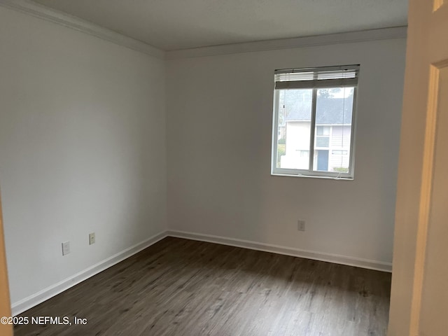 8880 Old Kings Rd S Unit 53, Jacksonville, FL 32257 - spare room with dark wood-style flooring and ornamental molding