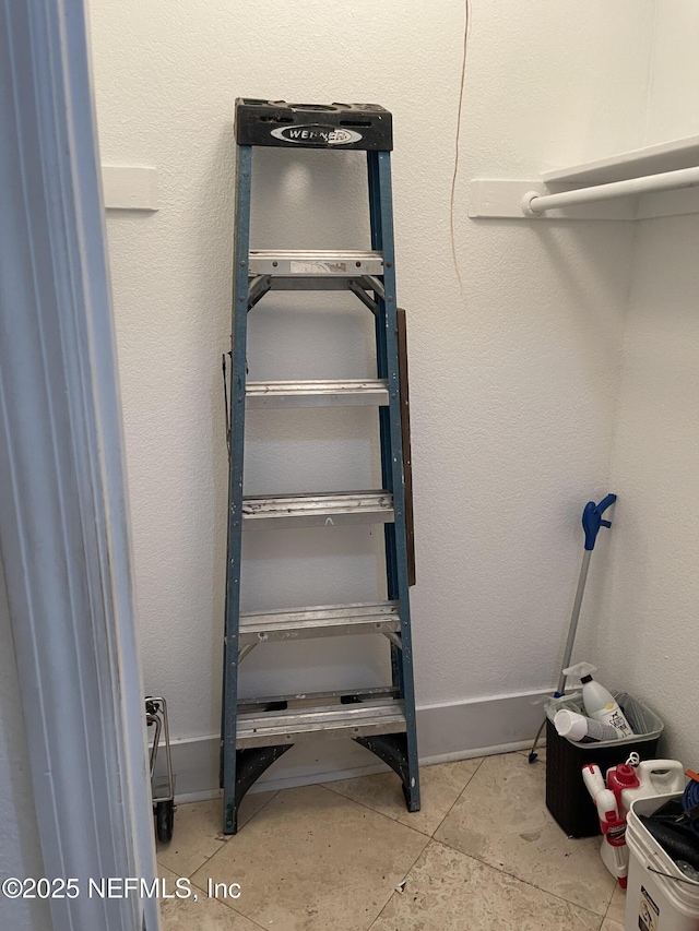 8880 Old Kings Rd S Unit 53, Jacksonville, FL 32257 - walk in closet featuring tile patterned floors