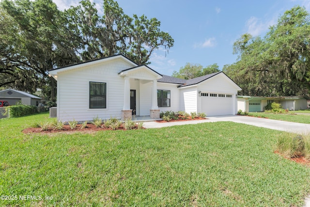 1114 Nantucket Ave, Jacksonville, FL 32233 - modern farmhouse style home featuring driveway, an attached garage, and a front yard