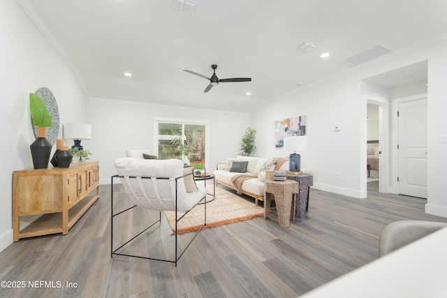 1114 Nantucket Ave, Jacksonville, FL 32233 - living room with wood finished floors, crown molding, ceiling fan, and recessed lighting