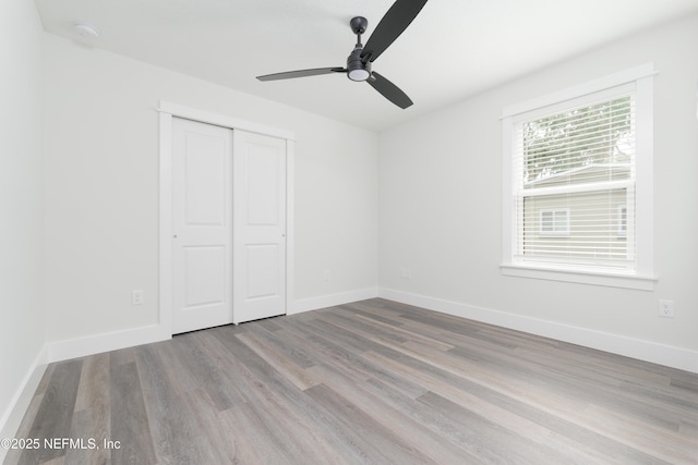 1114 Nantucket Ave, Jacksonville, FL 32233 - unfurnished bedroom with wood finished floors, a closet, and ceiling fan