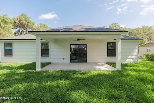 1114 Nantucket Ave, Jacksonville, FL 32233 - rear view of property featuring ceiling fan, a patio, a lawn, and a shingled roof
